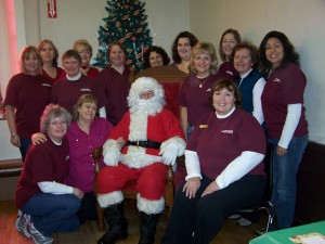 Pam and her team with Santa